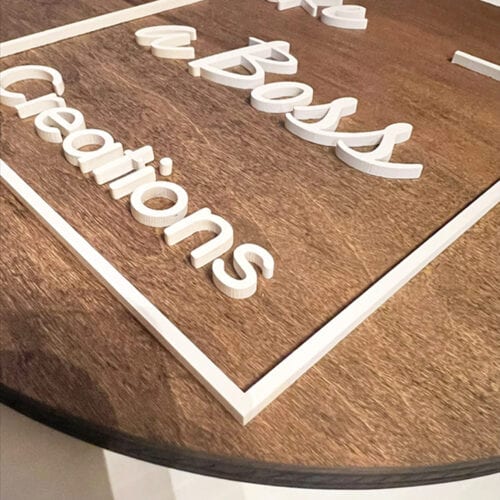 Round wood and acrylic signs side ways