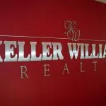 brushed metal wall sign