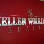 brushed metal wall sign